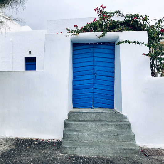White Wall Blue Plank Door
